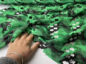 Maskinekniplet polyester - intens grøn og sort